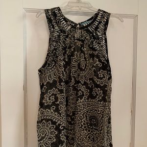 Sheer sleeveless top purchased at Anthropologie.